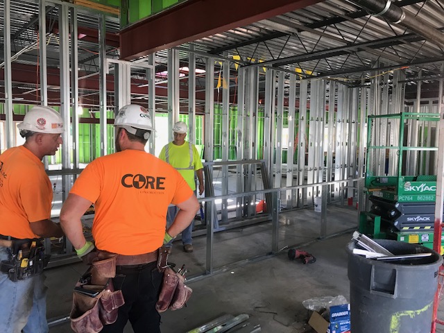 metal studs and steel i-beams of interior of Life Home