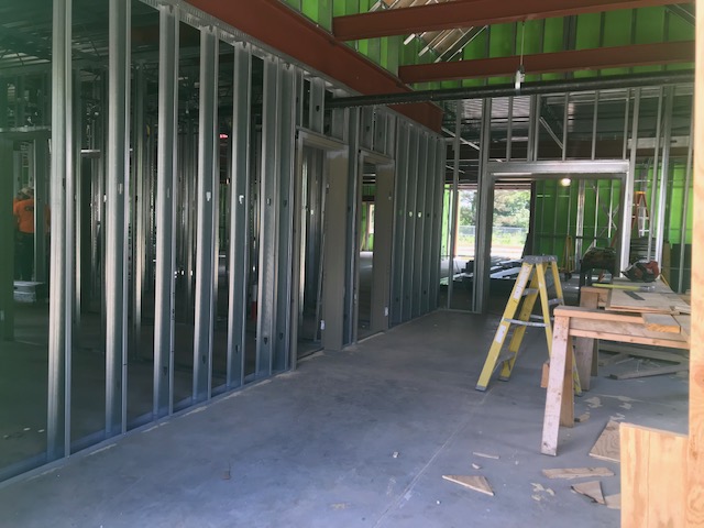 metal studs and steel i-beams of interior of Life Home