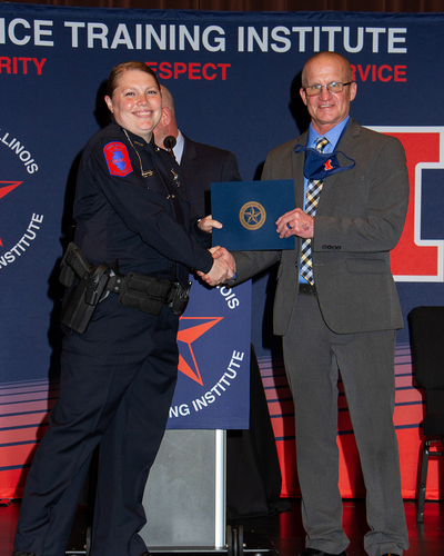 Police Officer receiving certificate